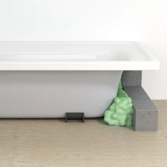 fischer 2K-Schnellschaum PU 400 B2 grün expandierend an Betonblock und weißem Rahmen, Anwendungsbeispiel