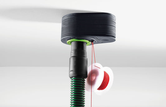 Festool Vakuum-Spanndüse CT-W mit grüner Haltevorrichtung, grüner Feder und rotem Saugschlauch, Ansicht von oben